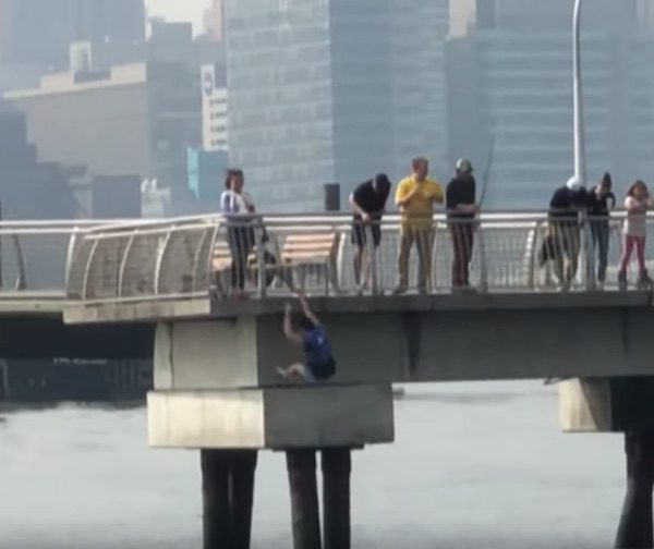man rescues dog from river