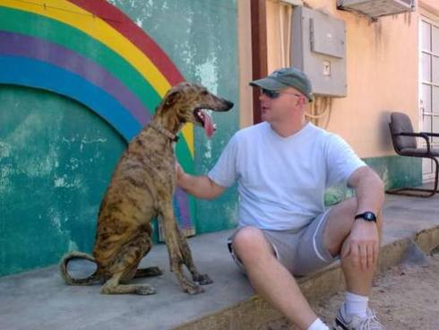 John visiting Doggie at the kennel